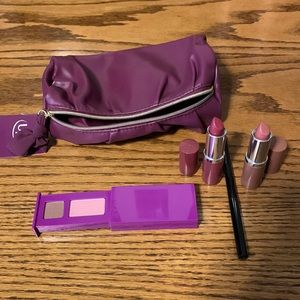 Clinique makeup: 2 lipsticks, 1 eyeliner, 1 eyeshadow duo, makeup bag